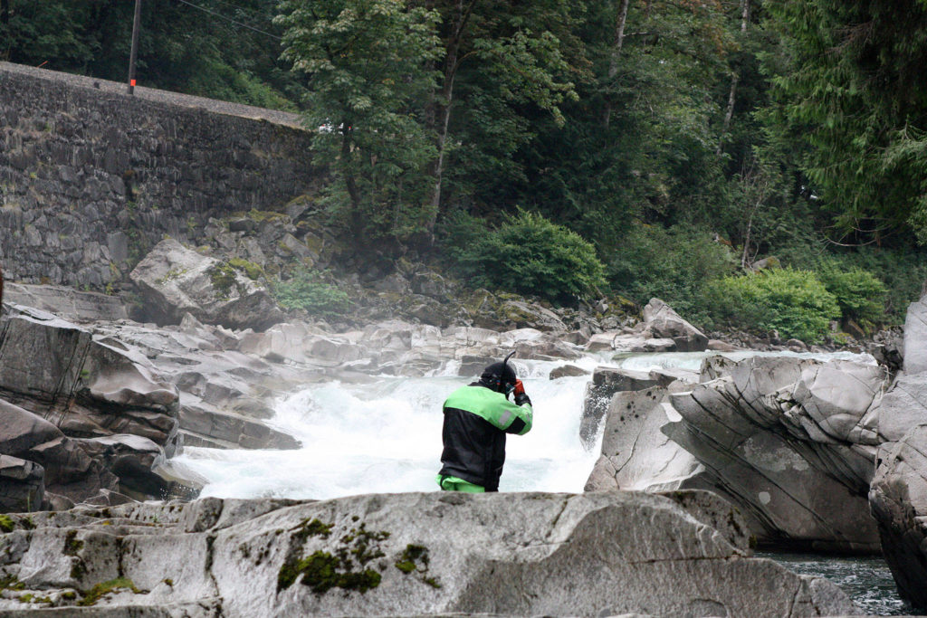 Sheriff’s search and rescue Sgt. Sanders gets ready to go into the water at Eagle Falls on Aug. 8, 2020. (Zachariah Bryan / The Herald)
