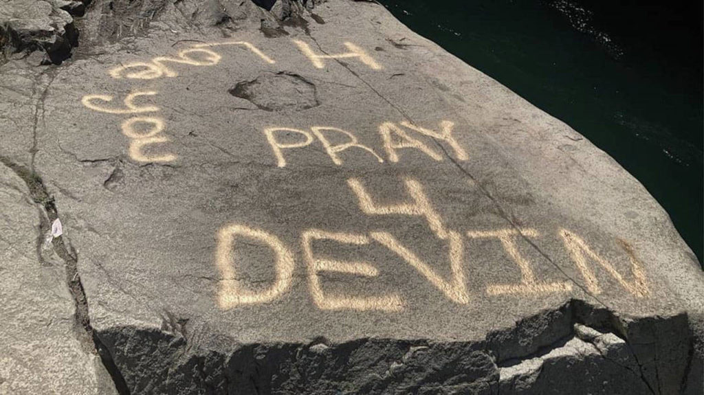 “Pray for Devin” is spray-painted on rocks near Eagle Falls.
