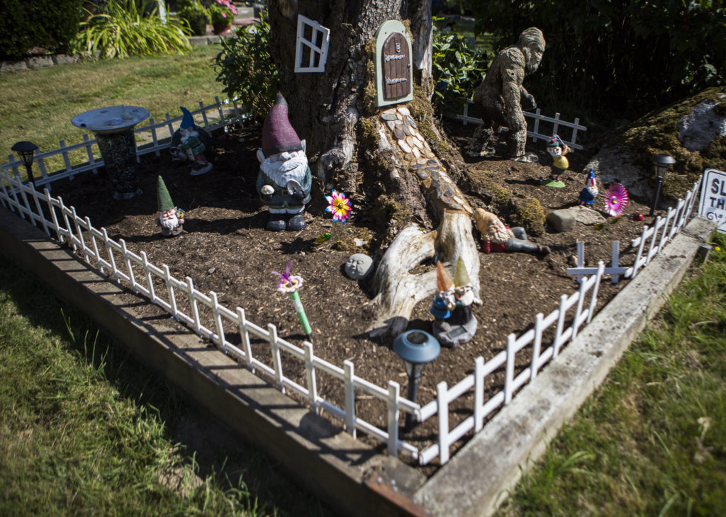 A gnome-size fenced yard surrounds the Cogswells’ creation. (Olivia Vanni / The Herald)
