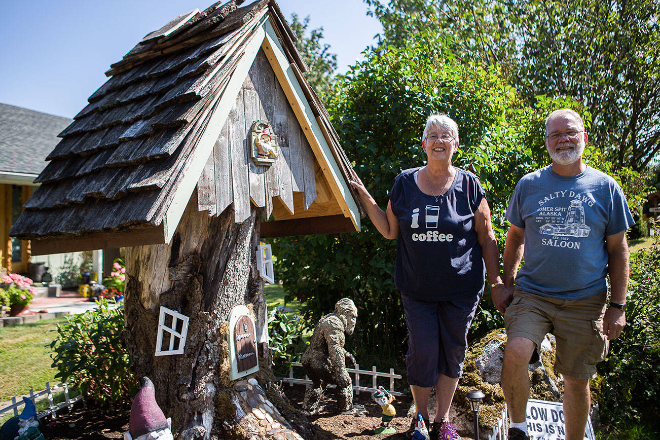 Debbie and Ed Cogswell of Tulalip built their gnome home on the stump of a tree they cut down five years ago. (Olivia Vanni / The Herald)