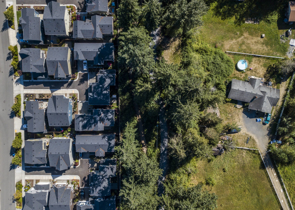 The southern boundary of Timber Creek subdivision, which borders a handful of properties along 43rd Avenue whose owners are hoping for a zoning change. (Olivia Vanni / The Herald)
