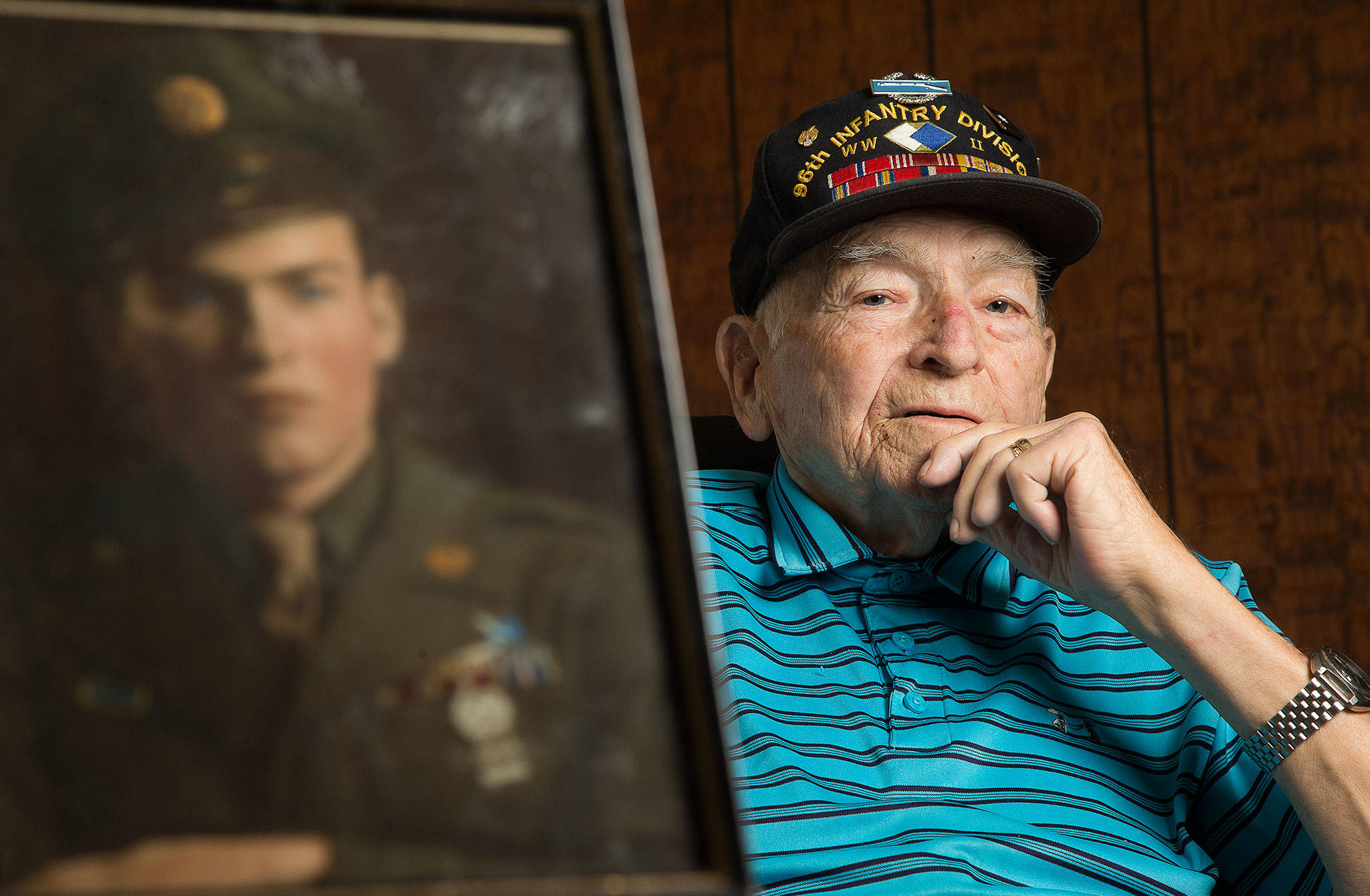 World War II veteran Farlan Dubarry, 94, talks about his time in the military, on Okinawa and then the Philippines, at his home in Marysville. A widower, Dubarry was invited to be in Hawaii this week. Before COVID-19 forced changes in plans, veterans from around the nation were to have been honored in person on the official 75th anniversary commemoration of the end of World War II. (Andy Bronson / The Herald)