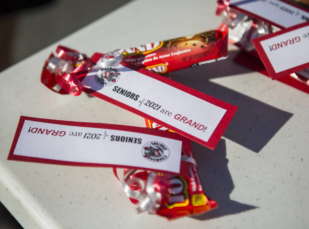 Incoming Stanwood High seniors received 100 Grand candy bars with tags that read, “Seniors of 2021 are grand!” on the first day of school Thursday. (Olivia Vanni / The Herald)
