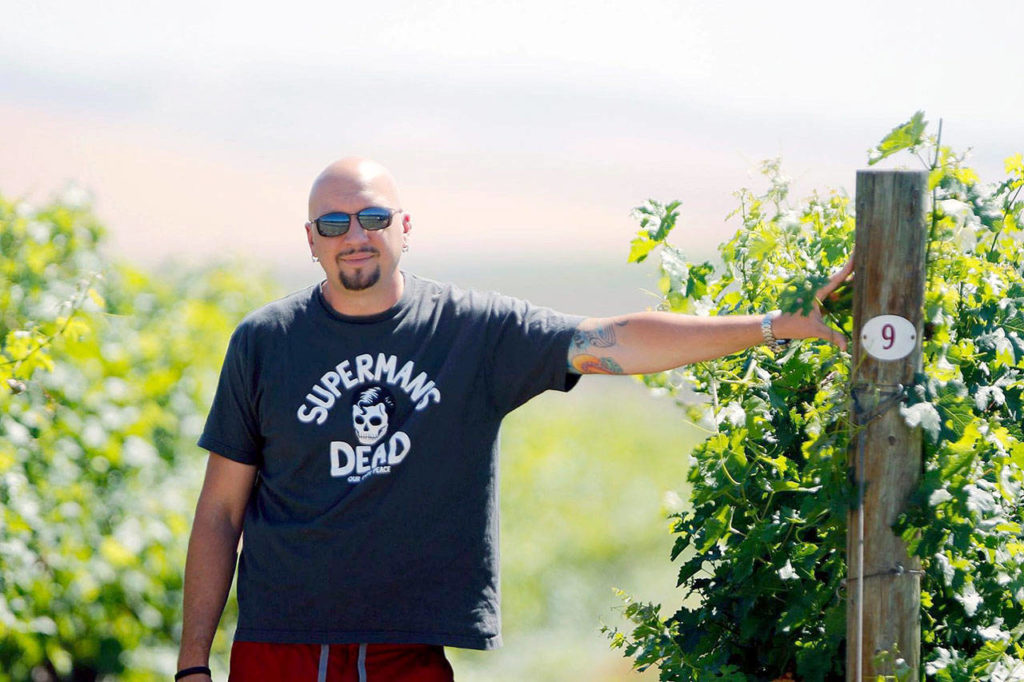 Brad Binko, standing in the Walla Walla Valley’s Les Collines Vineyard, focuses on single-vineyard bottlings under his Eternal Wines project. (Photo by Jon Wells)
