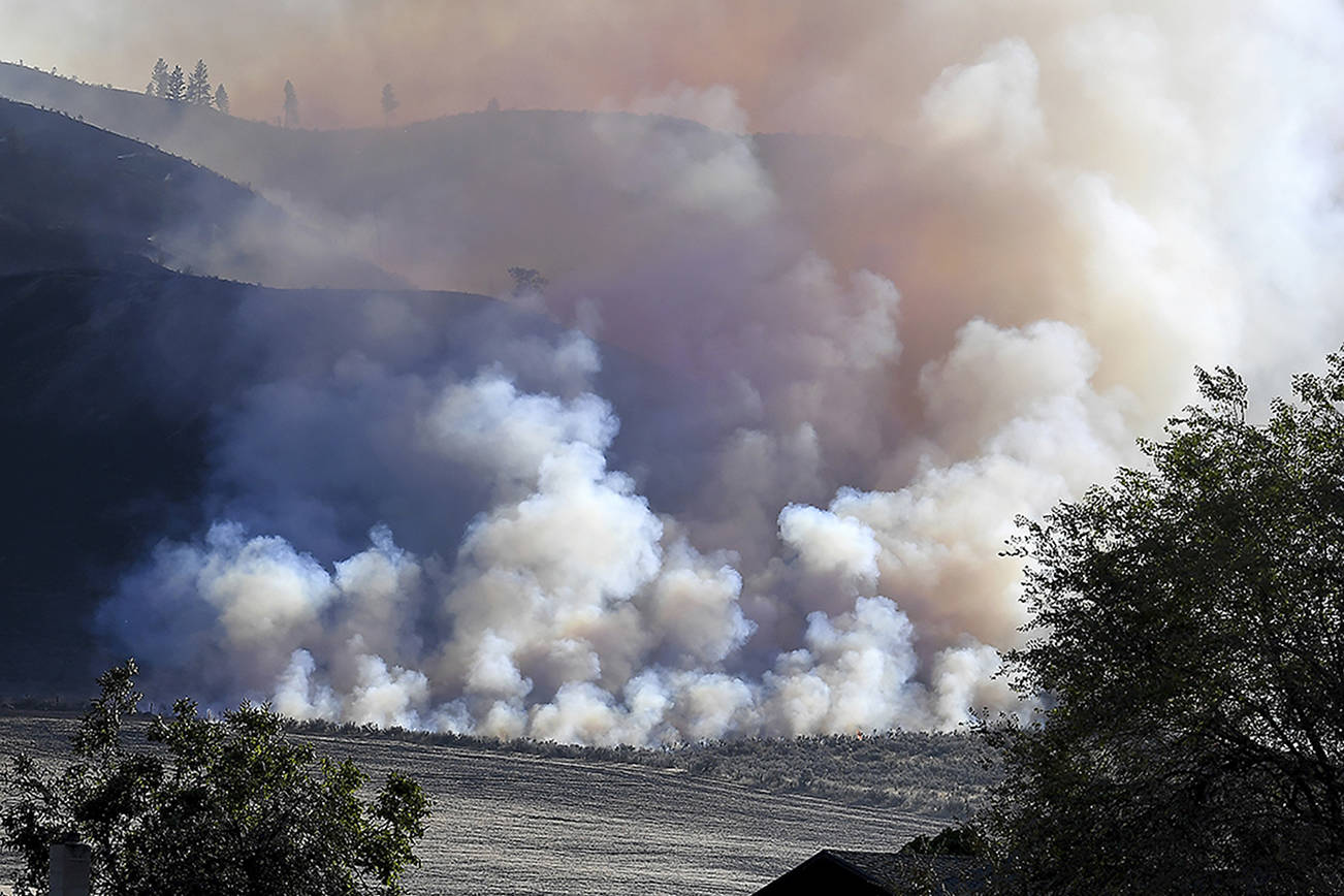 Winds kick up Northwest wildfires; Washington town destroyed