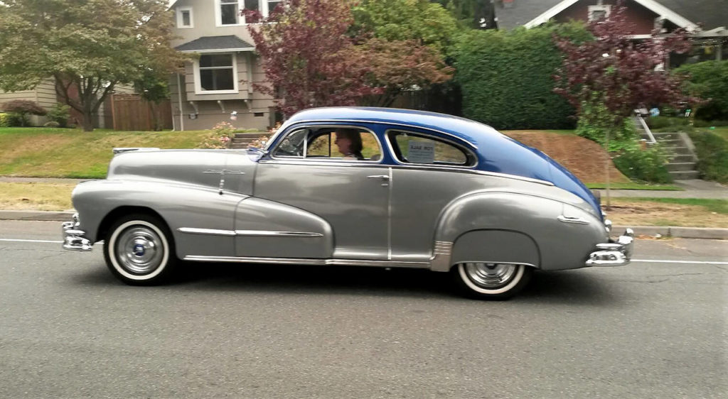 A gray and blue beauty drives north on Rucker Avenue during Saturday’s informal cruise of north Everett neighborhoods. (Julie Muhlstein / The Herald)
