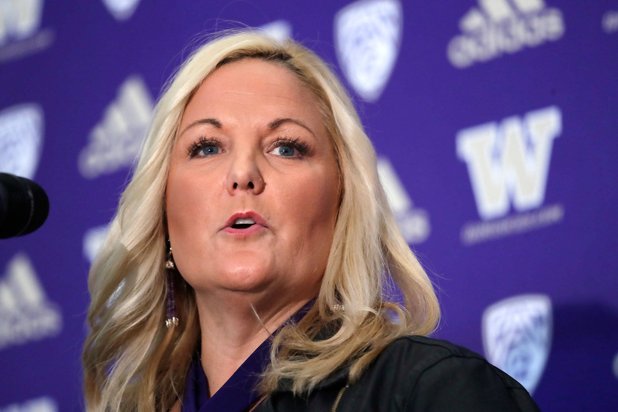 Washington athletic director Jen Cohen speaks during a news conference on Dec. 3, 2019, in Seattle. (AP Photo/Elaine Thompson)