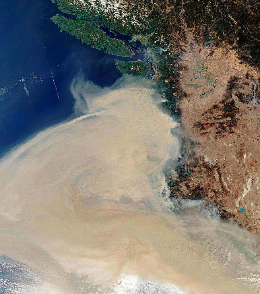 In this Thursday image provided by the European Space Agency, ESA, multiple fires can be seen hovering over the U.S. states of California, Washington and Oregon. In the top of the image, the cities of Vancouver and Seattle are visible. (ESA, CC BY-SA IGO 3.0 via AP)
