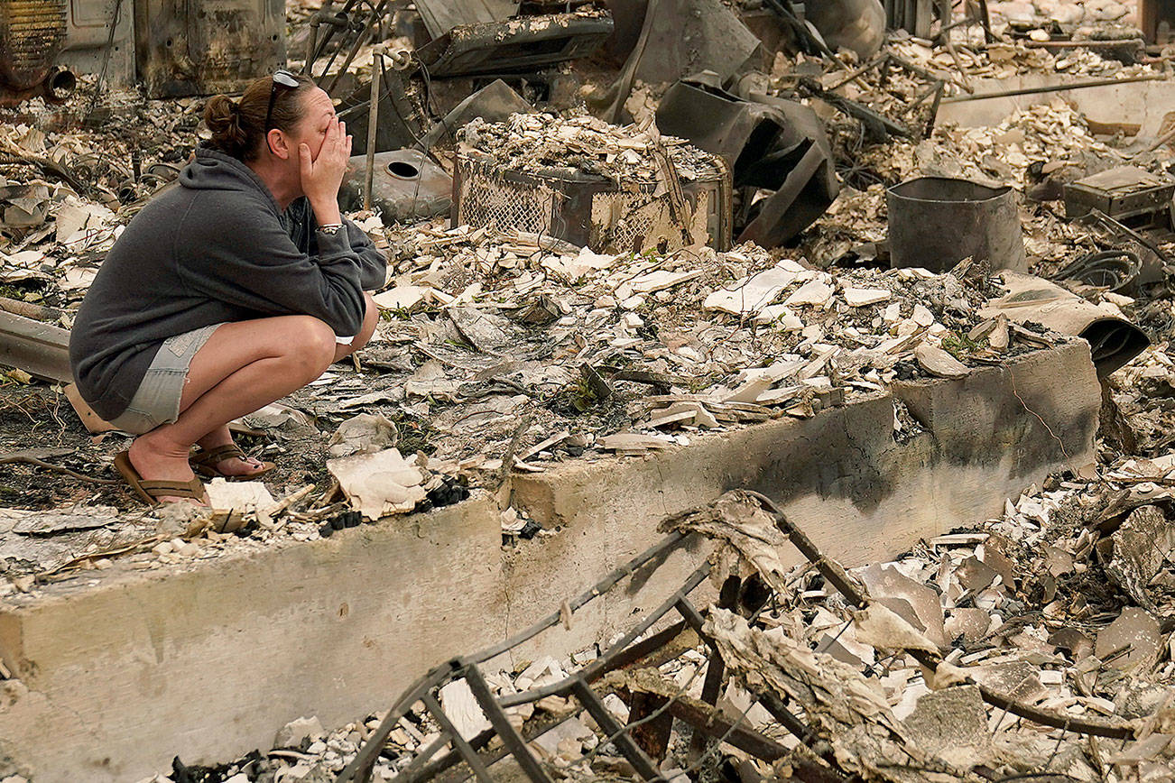 In Oregon, dozens are missing as fires bear down on suburbs