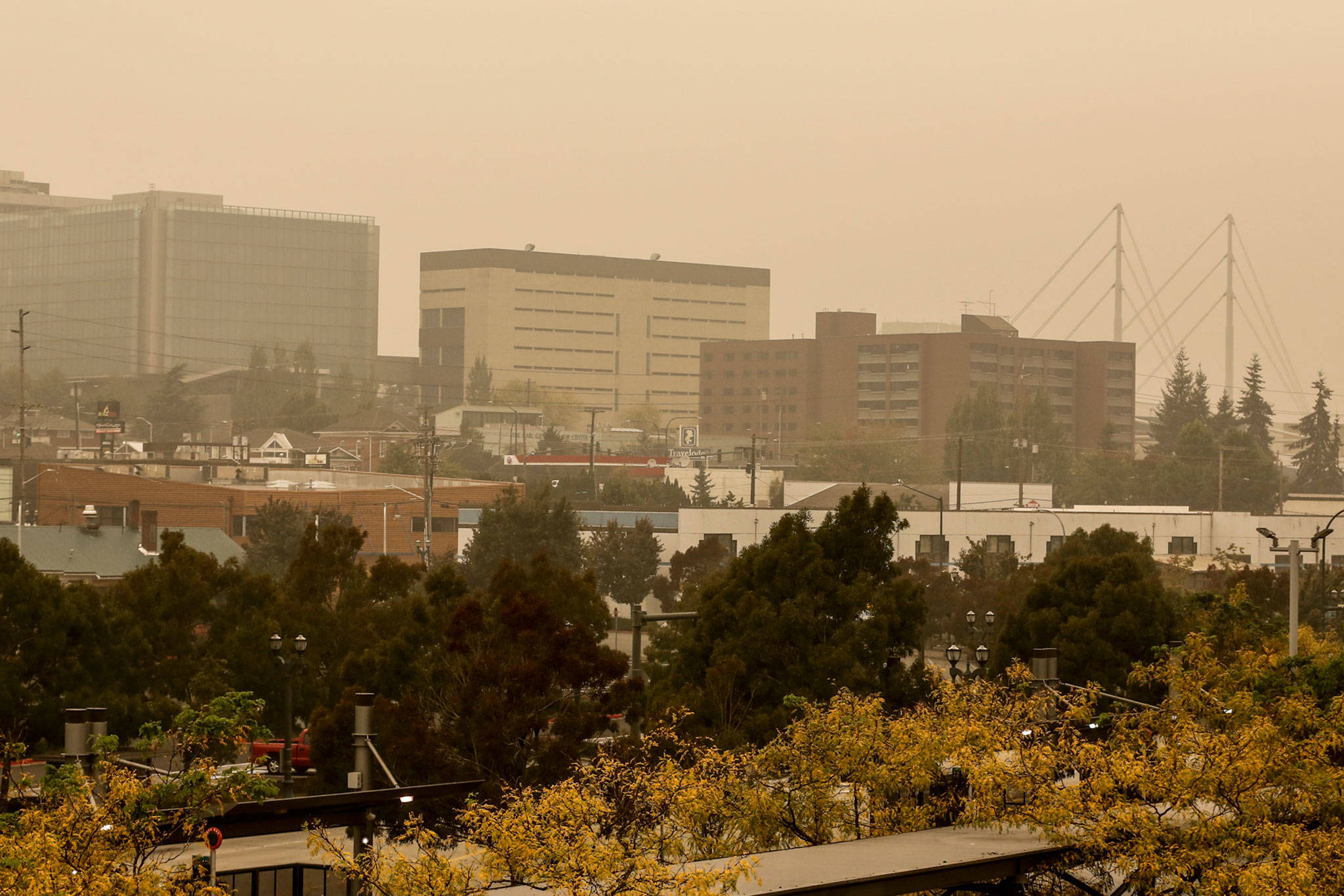 Downtown Everett was doused in smoke from West Coast wildfires on Saturday. (Kevin Clark / The Herald)