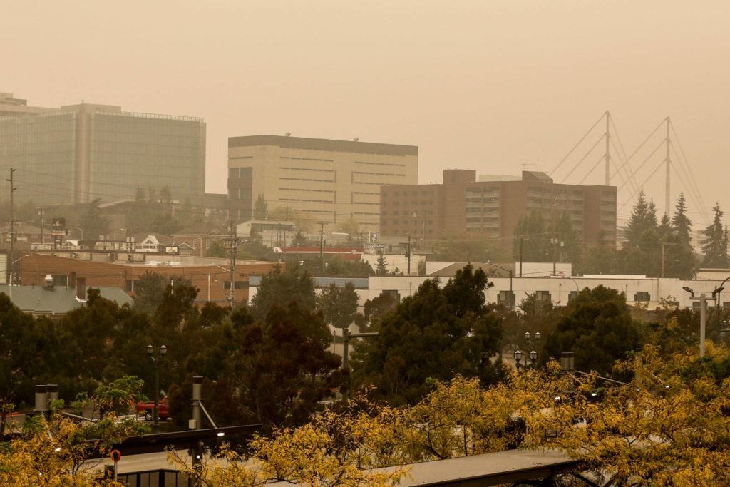 Downtown Everett was doused in smoke from West Coast wildfires on Saturday. (Kevin Clark / The Herald)
