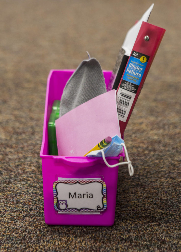A handful of school supplies and a mask for a student on Thursday in Stanwood. (Olivia Vanni / The Herald)
