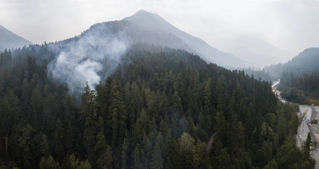 Smoke rises from the Downey Creek fire Sept. 18 off of Suiattle River Road in Darrington. (Olivia Vanni / The Herald)
