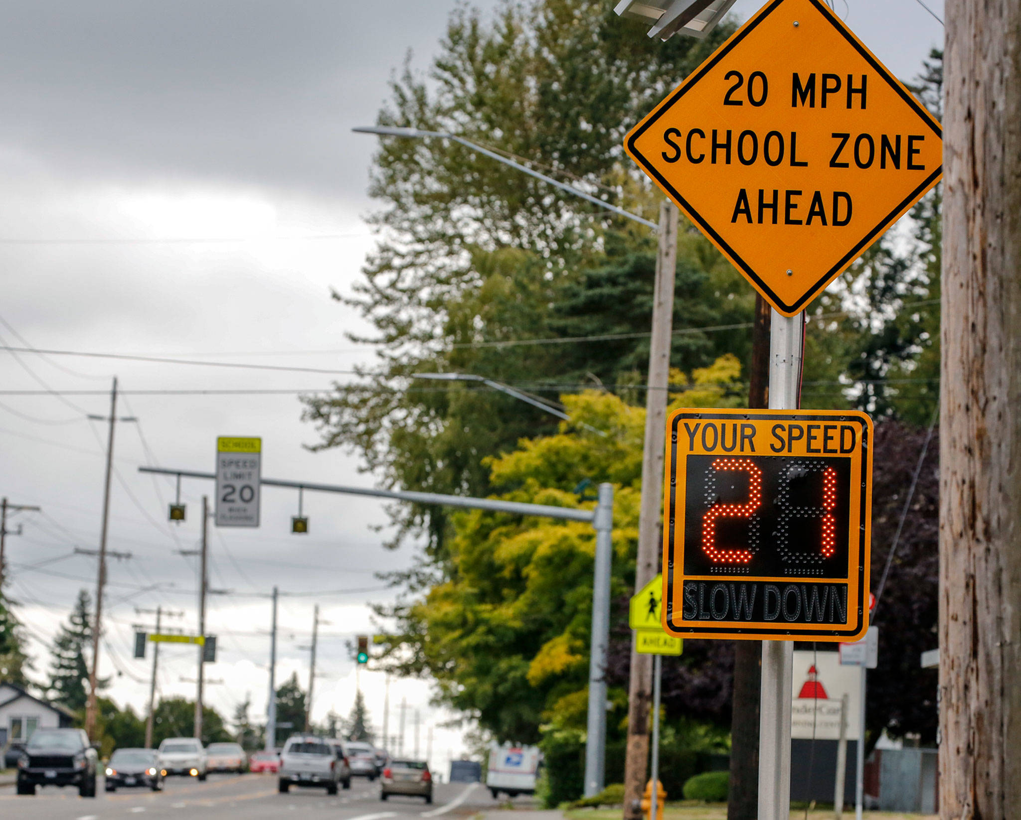 Some school zones with reduced speed limits are active, even though students aren’t in the buildings, while others are not. (Kevin Clark / The Herald)