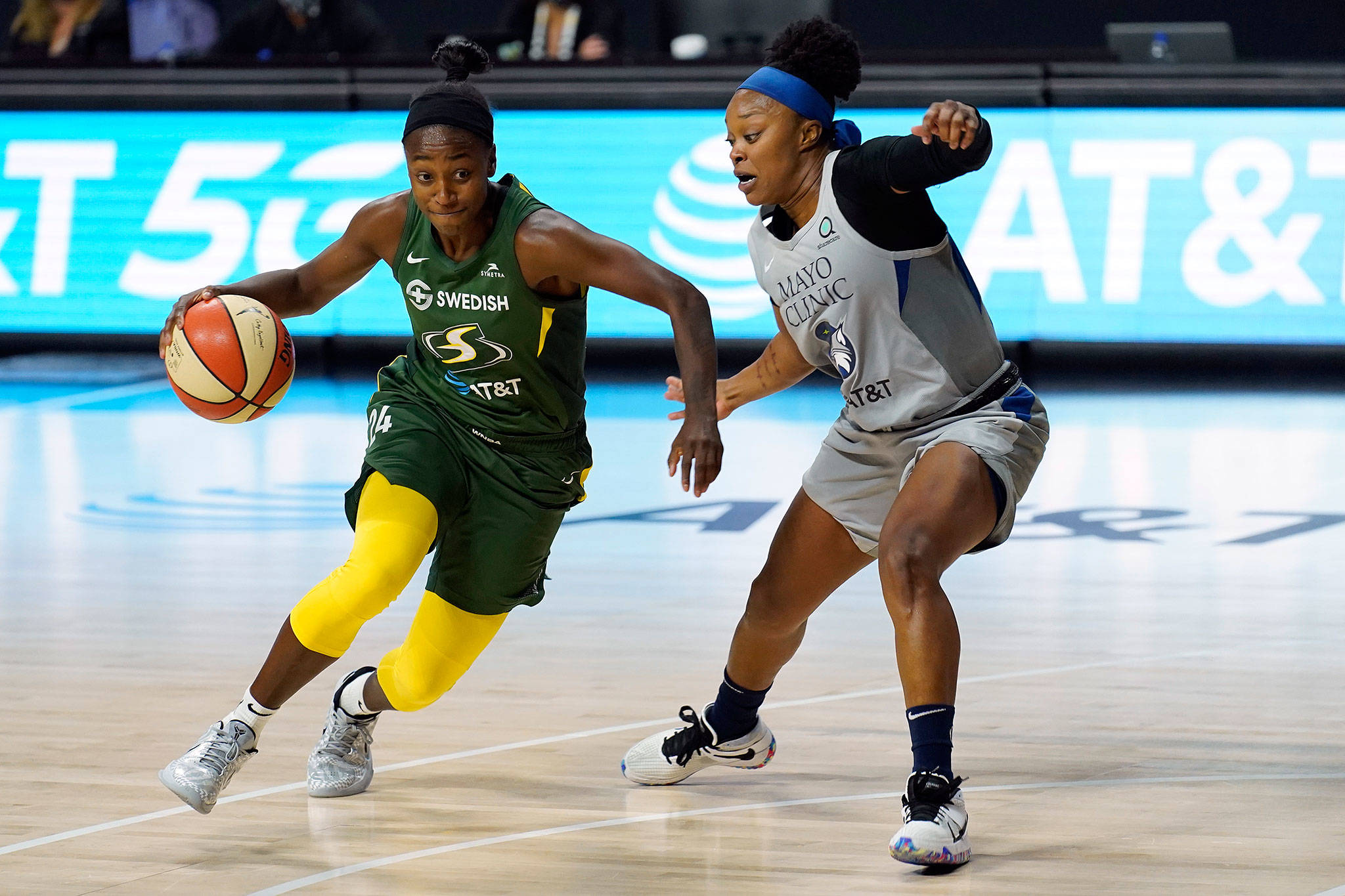Storm guard Jewell Loyd (24) drives around Lynx guard Odyssey Sims (1) during the second half of a playoff game on Sept. 24, 2020, in Bradenton, Fla. (AP Photo/Chris O’Meara)