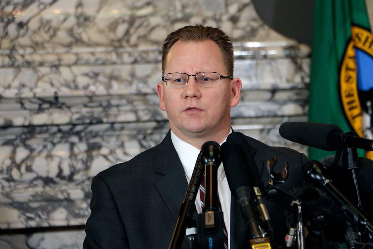 State Superintendent of Public Instruction Chris Reykdal talks to the media in March about the decision to close schools in three counties in response to COVID-19. Reykdal is running for reelection aginst Maia Espinoza. (Rachel La Corte / Associated Press file)