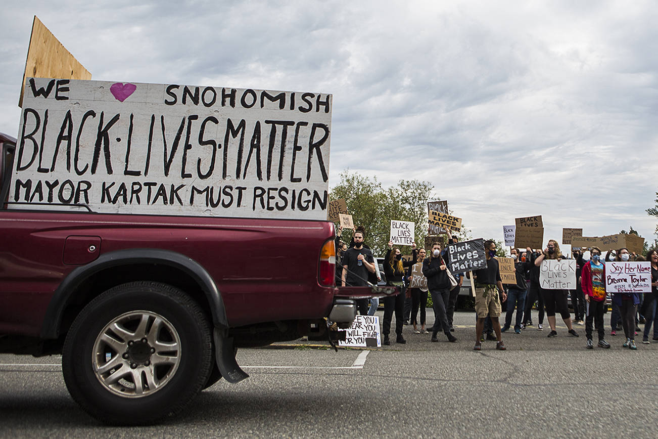 Protesters gather along First Street on Friday, June 5, 2020 in Snohomish, Wa. (Olivia Vanni / The Herald)