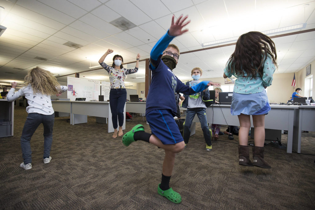 Students get in some physical activity at Electroimpact in Mukilteo. (Andy Bronson / The Herald)
