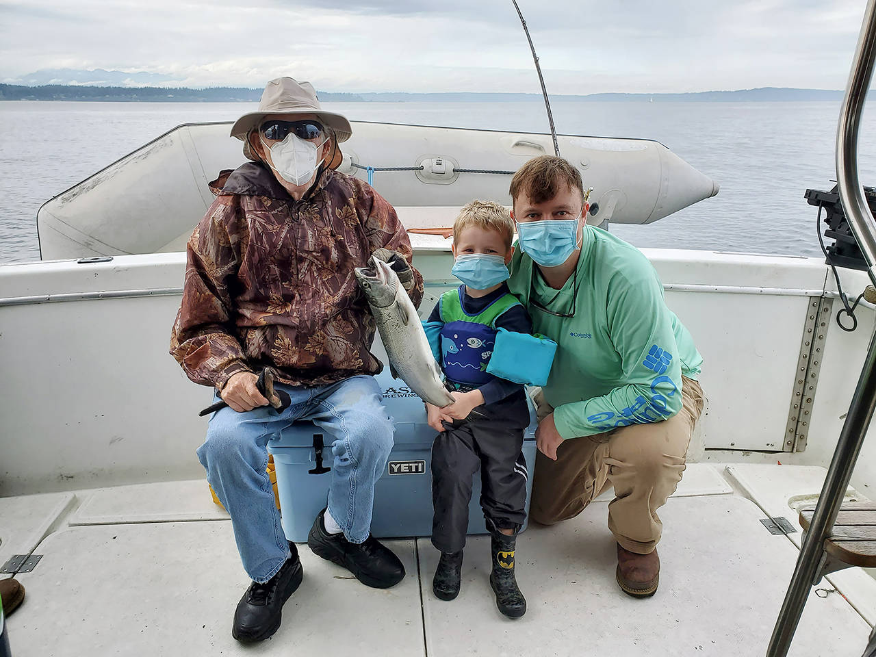 Michael O’Donnell (left) with his great-grandson J.J. Taylor and grandson Shawn O’Donnell Jr. at Elliott Bay, Puget Sound. (Submitted photo)