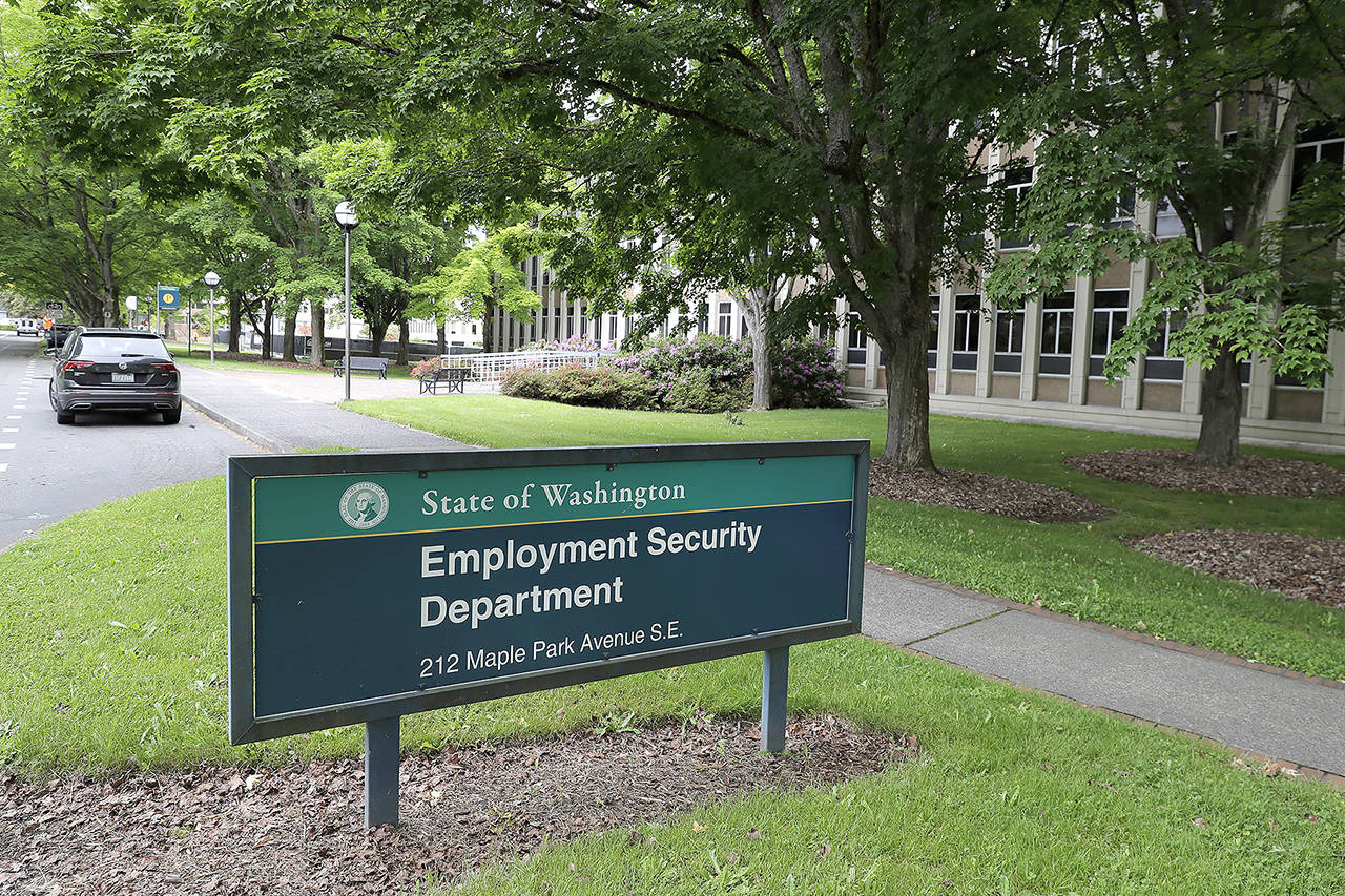 This photo shows a sign at the headquarters for Washington state’s Employment Security Departmenton Tuesday, May 26, 2020, at the Capitol in Olympia. (Ted S. Warren / AP Photo)