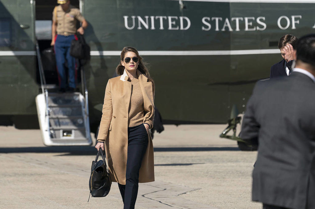 Counselor to the President Hope Hicks walks from Marine One to accompany President Donald Trump aboard Air Force One as he departs Wednesday at Andrews Air Force Base, Maryland. Hicks, President Donald Trump and first lady Melania Trump have all tested positive for the coronavirus. (AP Photo/Alex Brandon)
