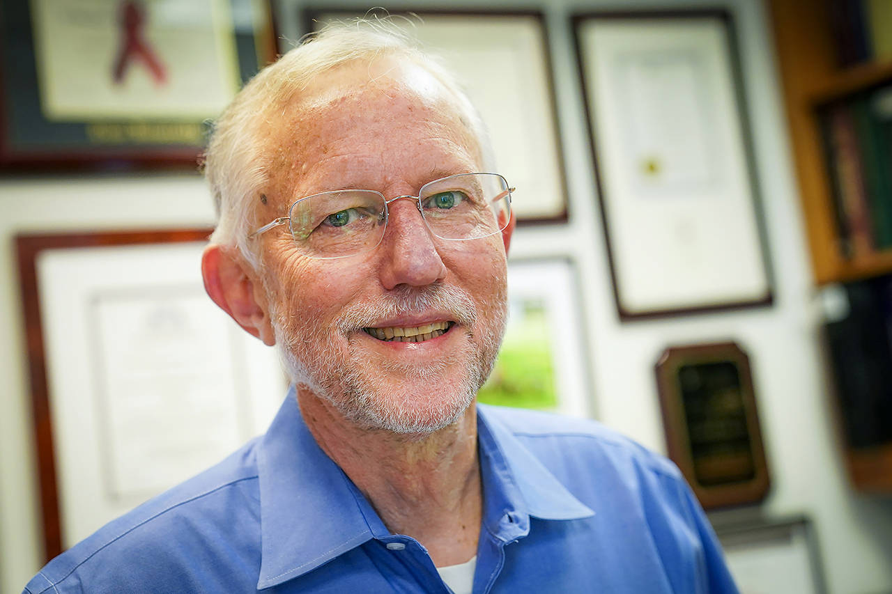 Charles M. Rice, professor of virology at Rockefeller University, poses for a portrait in his laboratory office Oct. 5 in New York. Rice was awarded the Nobel Prize in medicine on Monday for the discovery of the hepatitis C virus along with fellow American Harvey J. Alter and British-born scientist Michael Houghton. (AP Photo/John Minchillo)