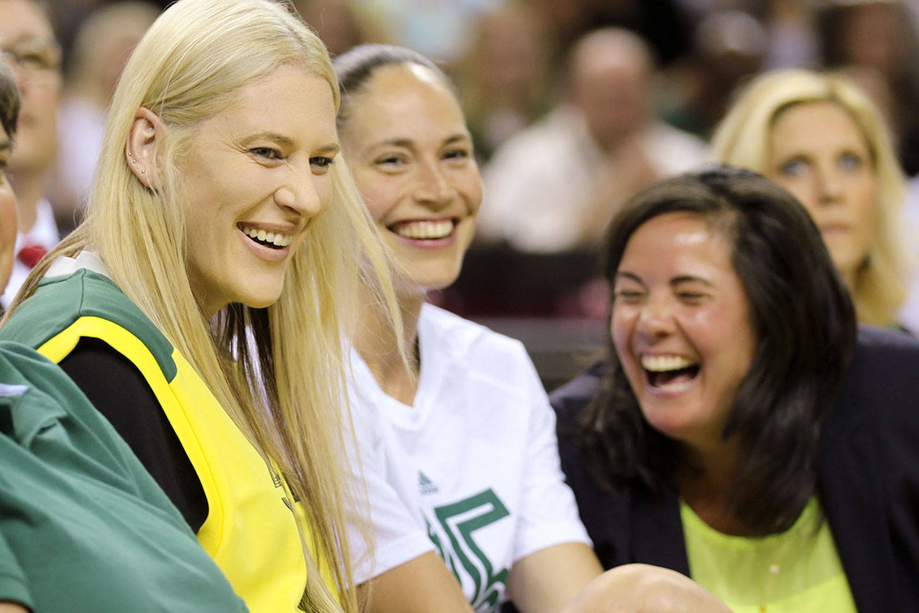 <ins>From left, Lauren Jackson, Sue Bird and Karen Bryant share a laugh during Jackson’s jersey retirement ceremony in 2016 in Seattle. (Kevin Clark / Herald file)</ins>