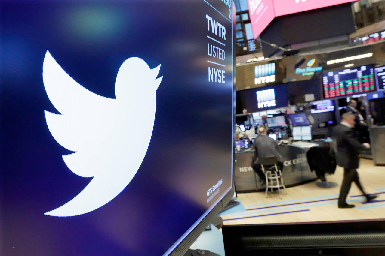In this 2018 photo, the logo for Twitter is displayed above a trading post on the floor of the New York Stock Exchange. (AP Photo/Richard Drew, File)