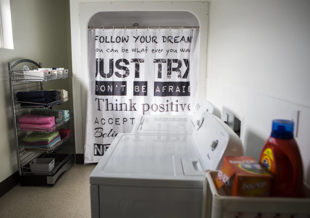The laundry and shower room is seen at the Marysville School District’s Connection Center for homeless students and their families on Thursday. (Olivia Vanni / The Herald)
