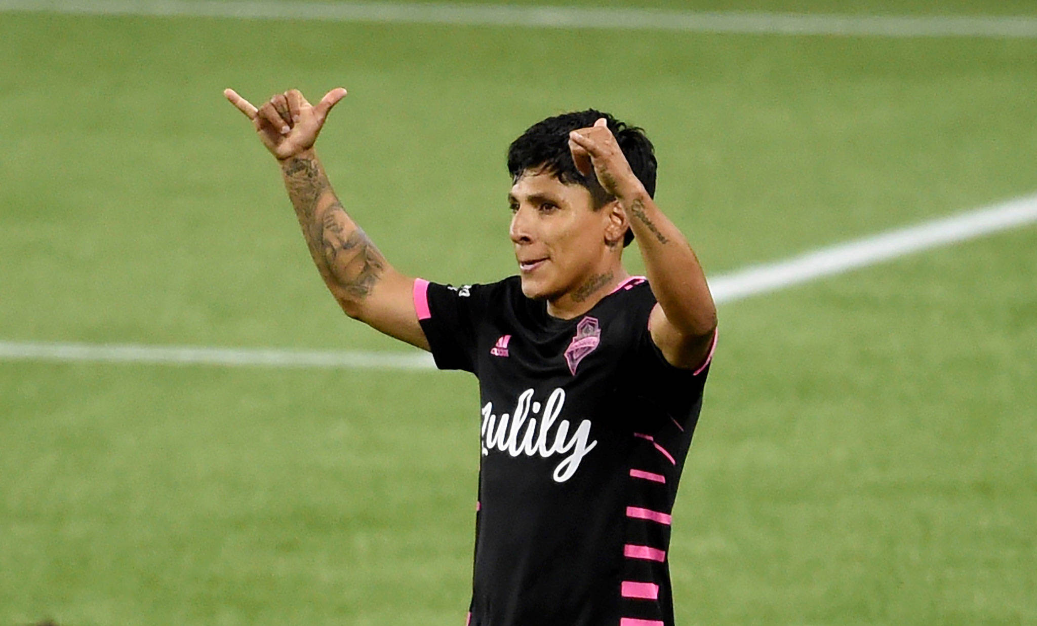 Sounders forward Raul Ruidiaz celebrates after scoring a goal during the second half of a match against the Timbers on Aug. 23, 2020, in Portland, Ore. (AP Photo/Steve Dykes)