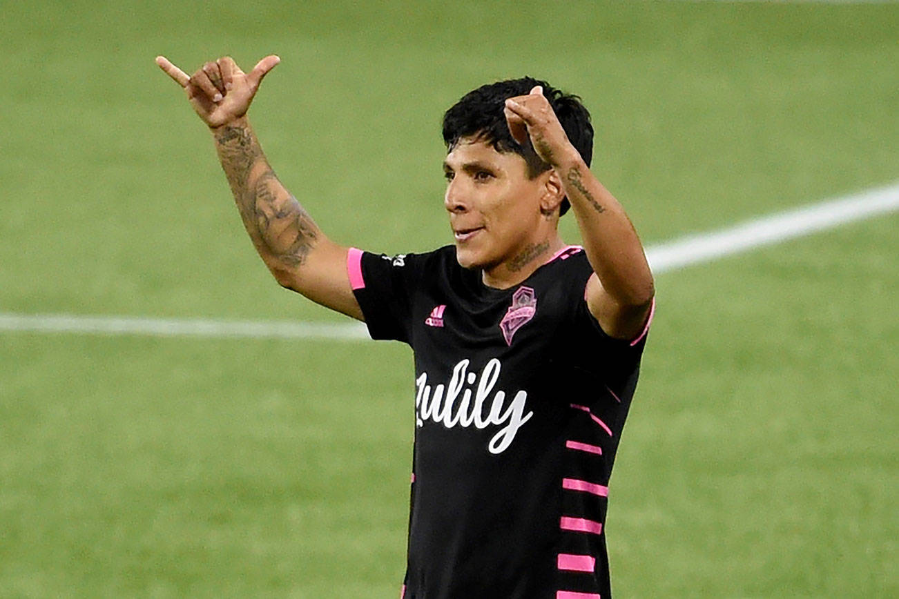 Seattle Sounders forward Raul Ruidiaz celebrates after scoring a goal during the second half of the team's MLS soccer match against the Portland Timbers in Portland, Ore., Sunday, Aug. 23, 2020. Ruidiaz scored twice as the Sounders won 3-0. (AP Photo/Steve Dykes)