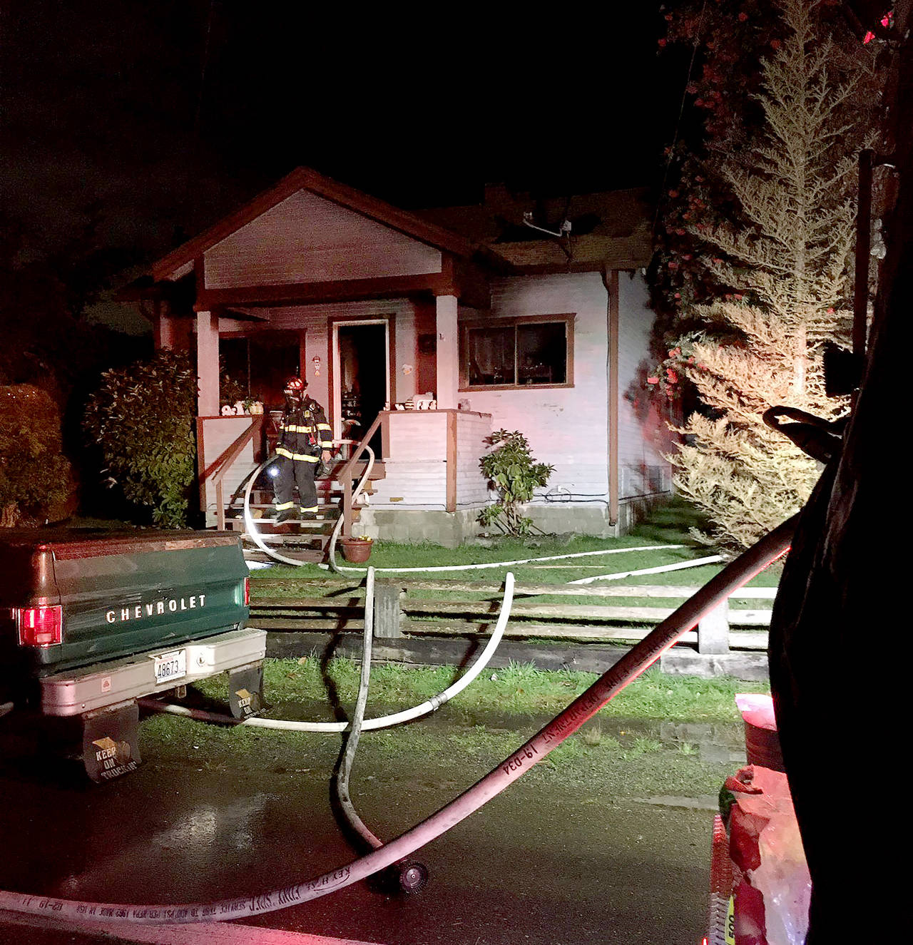 A person suffered minor injuries in a house fire late Tuesday evening in Everett. (Everett Fire Department)