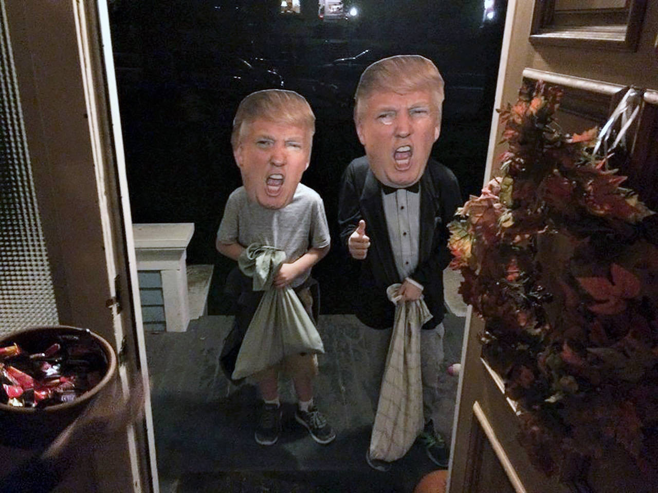 Trick-or-treaters in Donald Trump masks showed up on Julie Muhlstein’s doorstep Halloween night 2016, just days before the presidential election. This year, the pandemic will make Halloween traditions tricky. (Julie Muhlstein / The Herald)