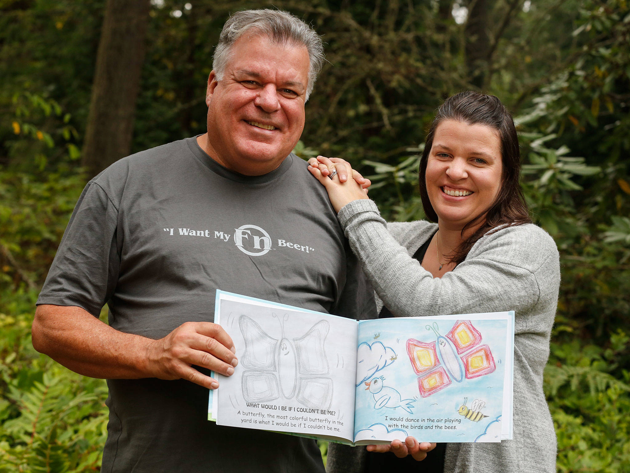 Jim Jamison and his daughter, Stephanie Schisler, wrote and illustrated “What Would I Be If I Couldn’t Be Me.” (Kevin Clark / The Herald)