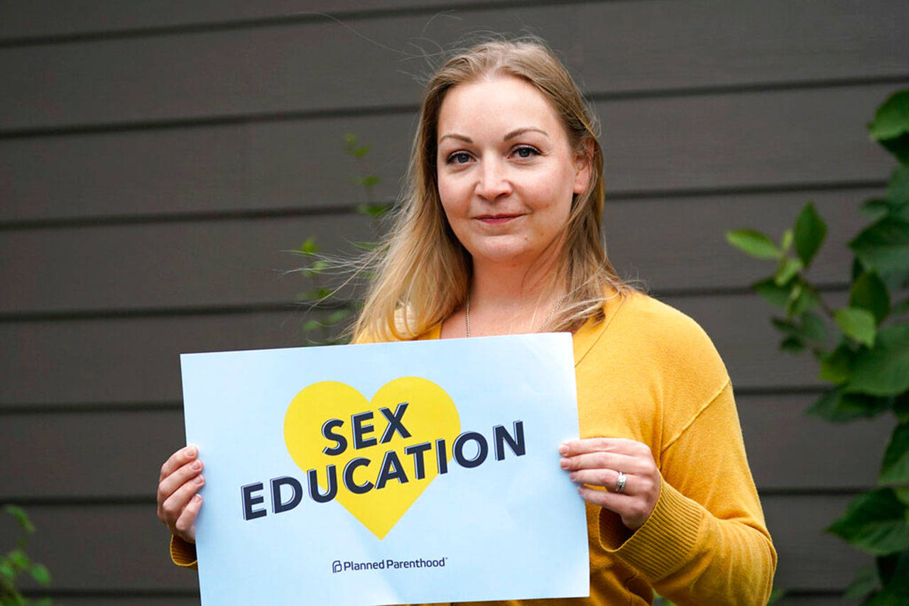 Courtney Normand, a Snohomish County mother of two, is director of the Planned Parenthood-affiliated political group Safe & Healthy Youth Washington that is supporting Referendum 90, which would expand a sex education requirement for all public schools but allow parents to opt their children out of the classes. (Elaine Thompson / Associated Press)