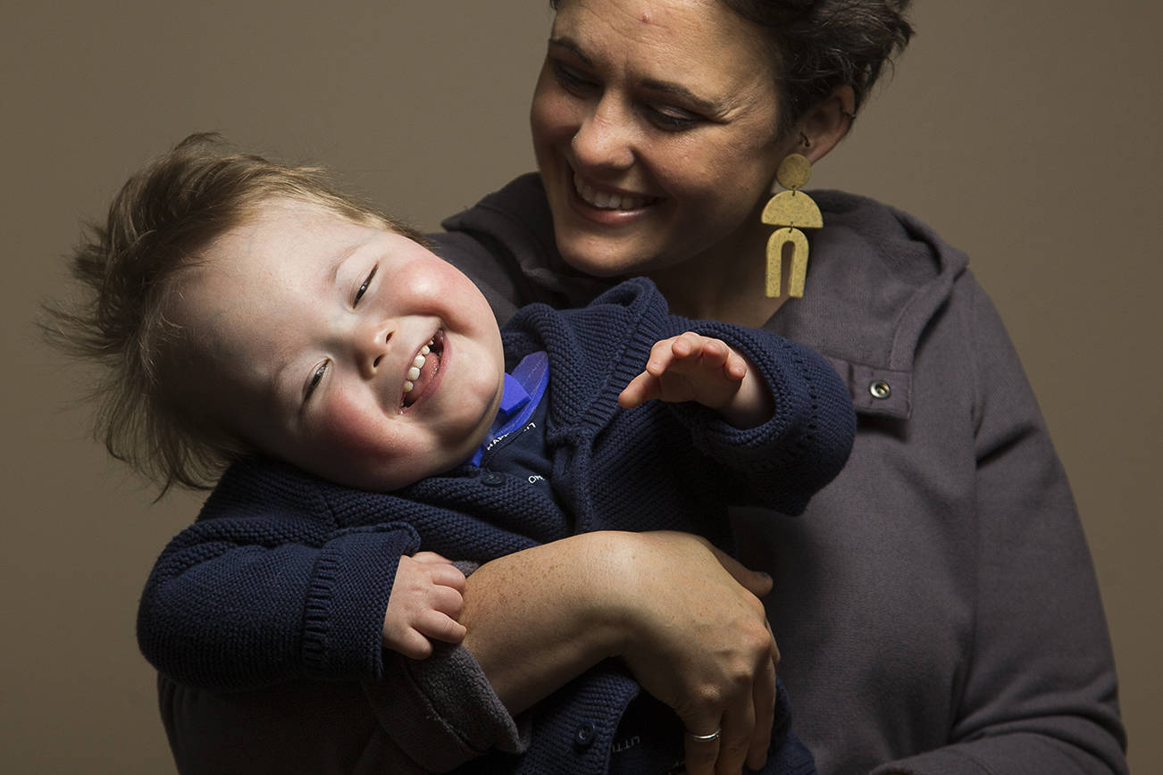 Lynnwood's Malachi Stohr was born with spina bifida. Not yet 3, he has spent much of his life at Seattle Children's Hospital. His mom, Whitney Stohr, wants her son to be seen as the wonderful boy he is, and not only as someone with special needs, on Wednesday, Oct. 21, 2020 in Lynnwood, Washington.  (Andy Bronson / The Herald)