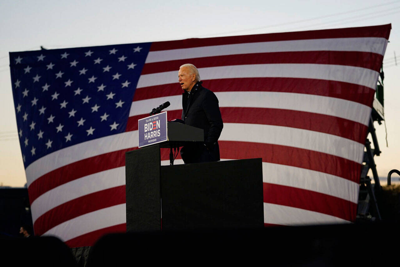 Democratic presidential candidate former Vice President Joe Biden speaks at Michigan State Fairgrounds in Novi, Mich., on Oct. 16. (Carolyn Kaster / Associated Press)