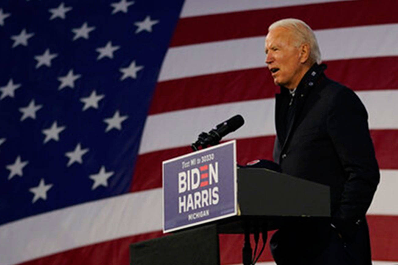 Democratic presidential candidate former Vice President Joe Biden speaks at Michigan State Fairgrounds in Novi, Mich., Friday, Oct. 16, 2020. (AP Photo/Carolyn Kaster)