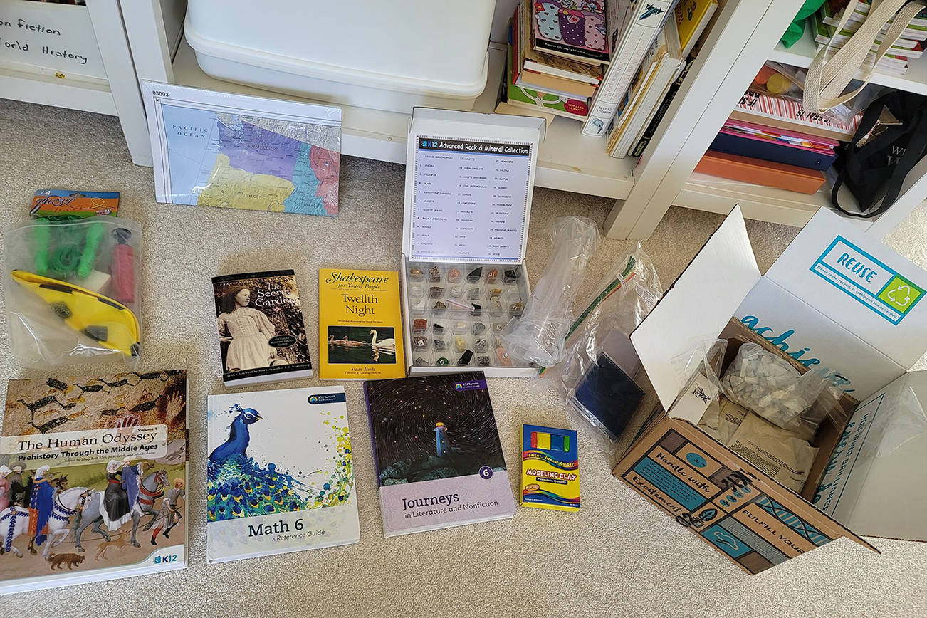 Washington Virtual Academy, a free public school option in Washington state, sends out kits of materials to help supplement online learning. Pictured here is the sixth-grade kit. (Jennifer Bardsley)