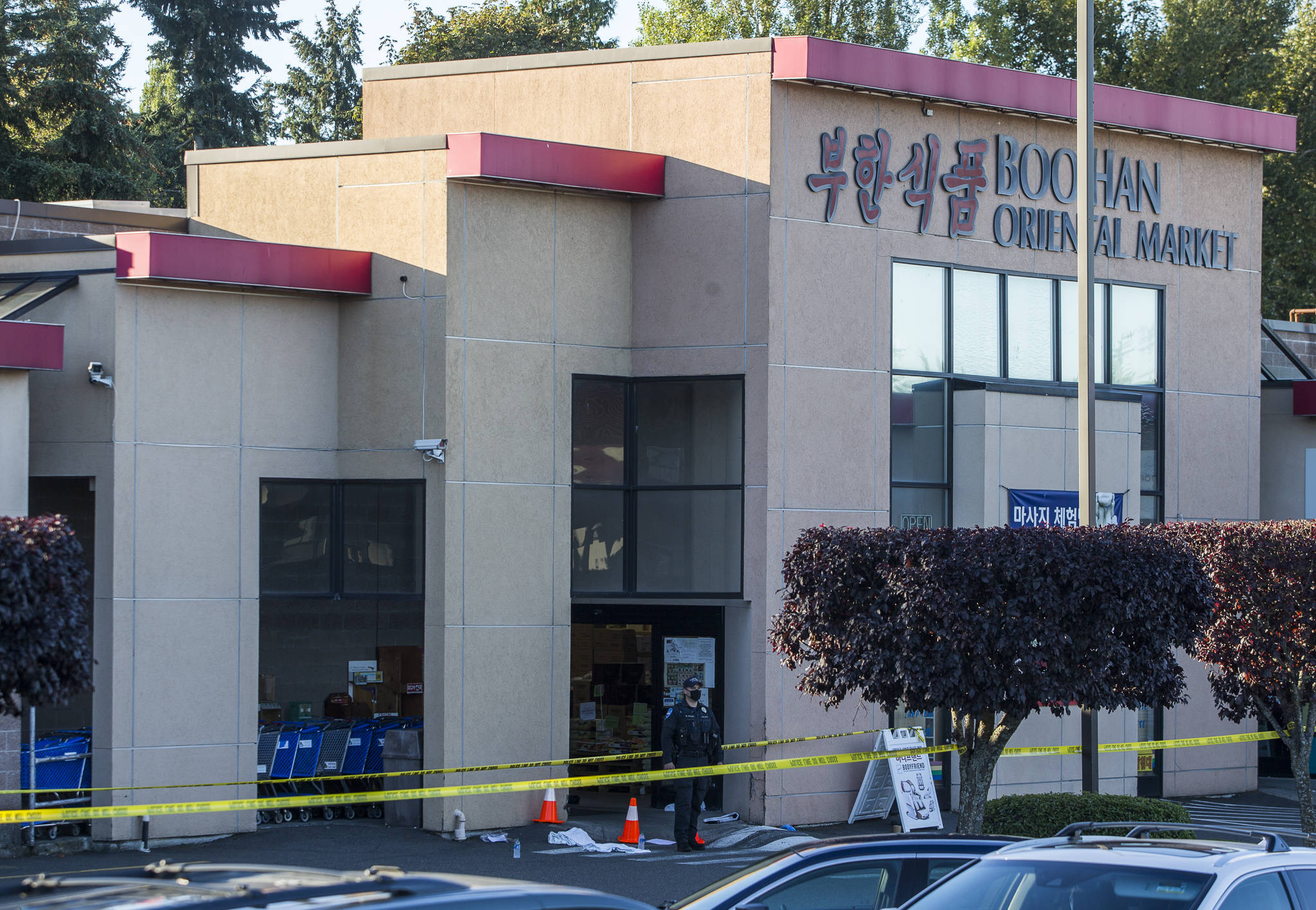 Three people were shot, one of them fatally, at the Boo Han Oriental Market in Edmonds on Sept. 29. (Olivia Vanni / Herald file)