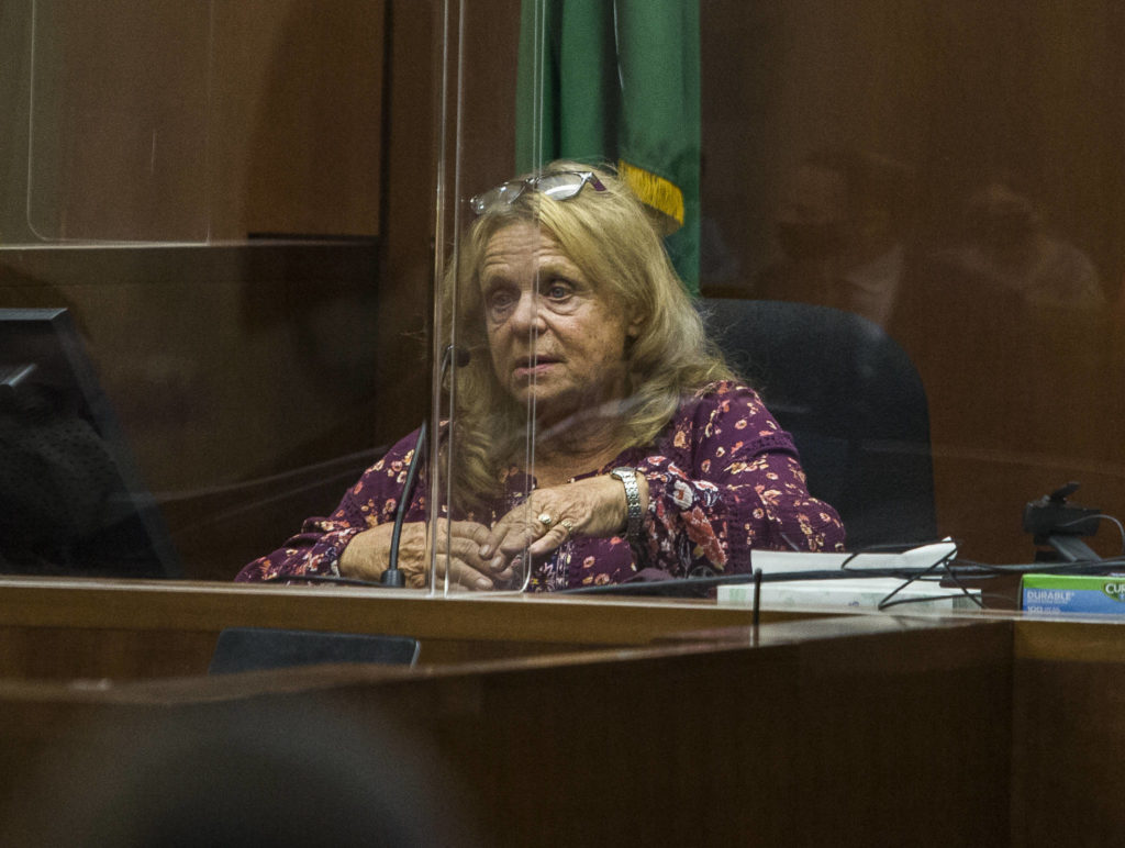 Jody Loomis’ neighbor and friend, Linda Hook, testifies Wednesday in Everett. (Olivia Vanni / The Herald) 
