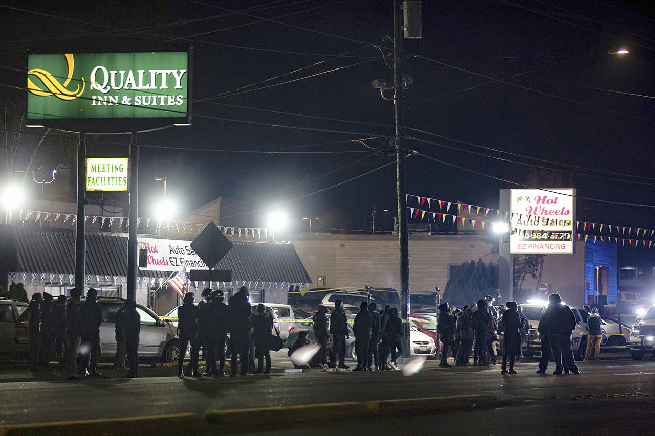 Protesters faced off with law enforcement officers at NE Highway 99, in Vancouver, Washington, on Thursday, after a police shooting. (Mark Graves/The Oregonian via AP)