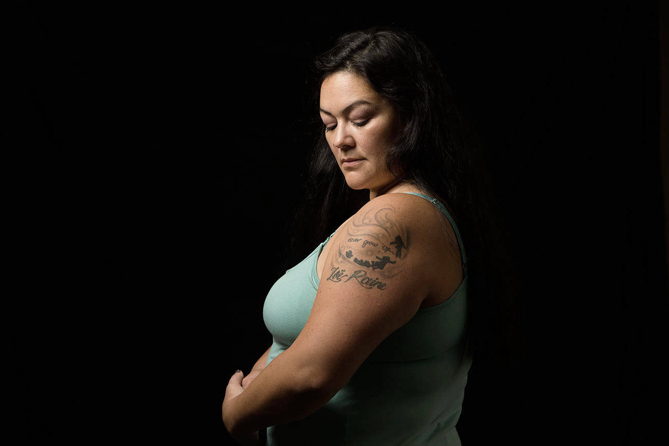 Michelle Jeffreys shows a tattoo honoring her daughter, Marysville Pilchuck High School shooting victim Zoe Galasso, on Wednesday, Oct. 28, 2020 in Everett, Washington.
Jeffreys has written a book, "My Rainbow to Keep," about the 2014 tragedy and her grief journey. (Andy Bronson / The Herald)