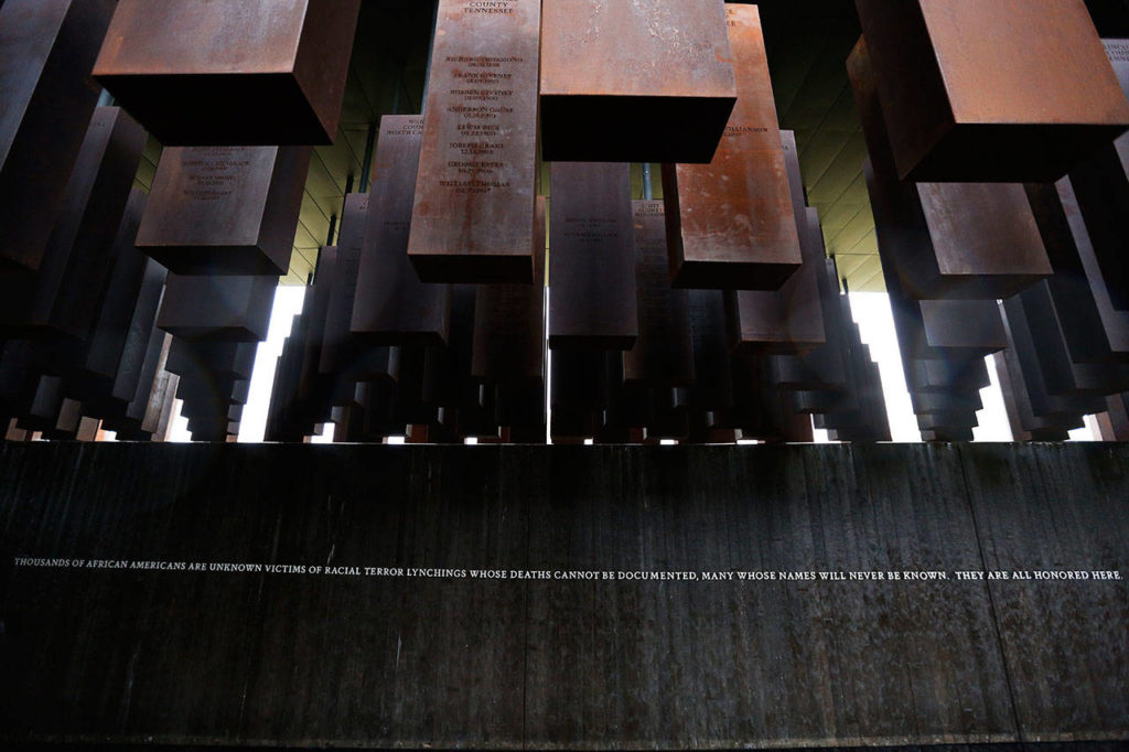 The National Memorial for Peace and Justice, opened in 2018 in Montgomery, Ala., depicts the lynchings of Black Americans with 800 six-foot mouments suspended above the ground. (Brynn Anderson / Associated Press file)

