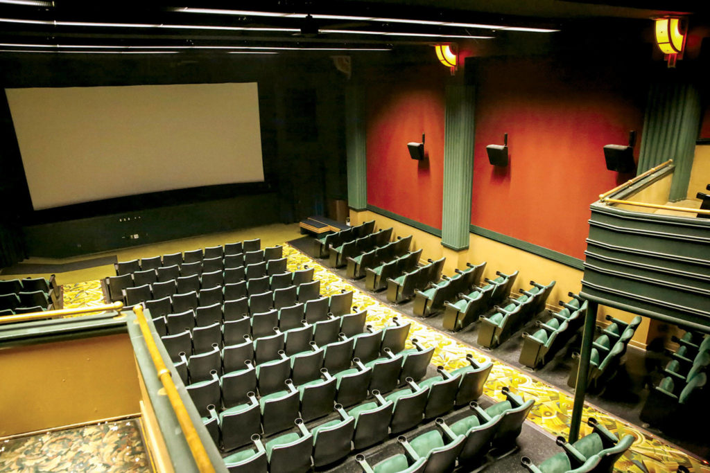 The 235-seat theater has a stage behind the screen, from its days as a place to see vaudeville shows. (Kevin Clark / The Herald)
