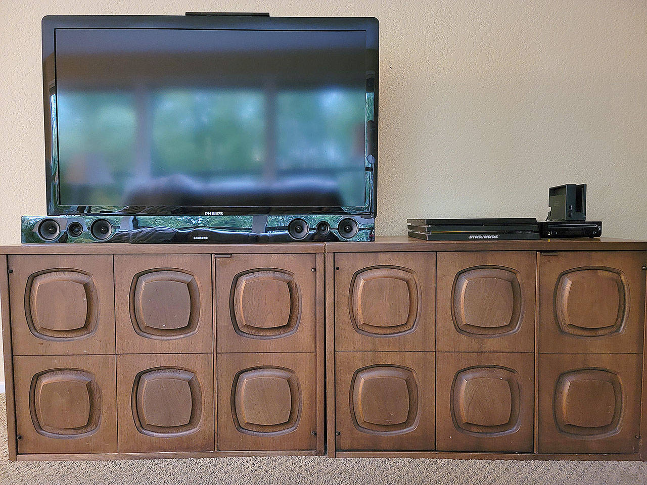 A tidied-up media cabinet is a lot cheaper than a brand-new $1,500 unit. (Jennifer Bardsley)