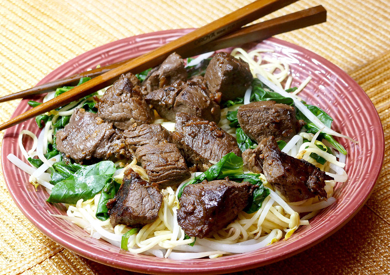 Cubes of tenderloin are coated with a garlicky glaze in this Korean steak bowl (Linda Gassenheimer)
