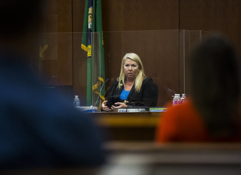 Snohomish County sheriff’s detective Kendra Conley testifies in the cold case murder trial of Terrence Miller at the Snohomish County Courthouse on Thursday in Everett. (Olivia Vanni / The Herald)

