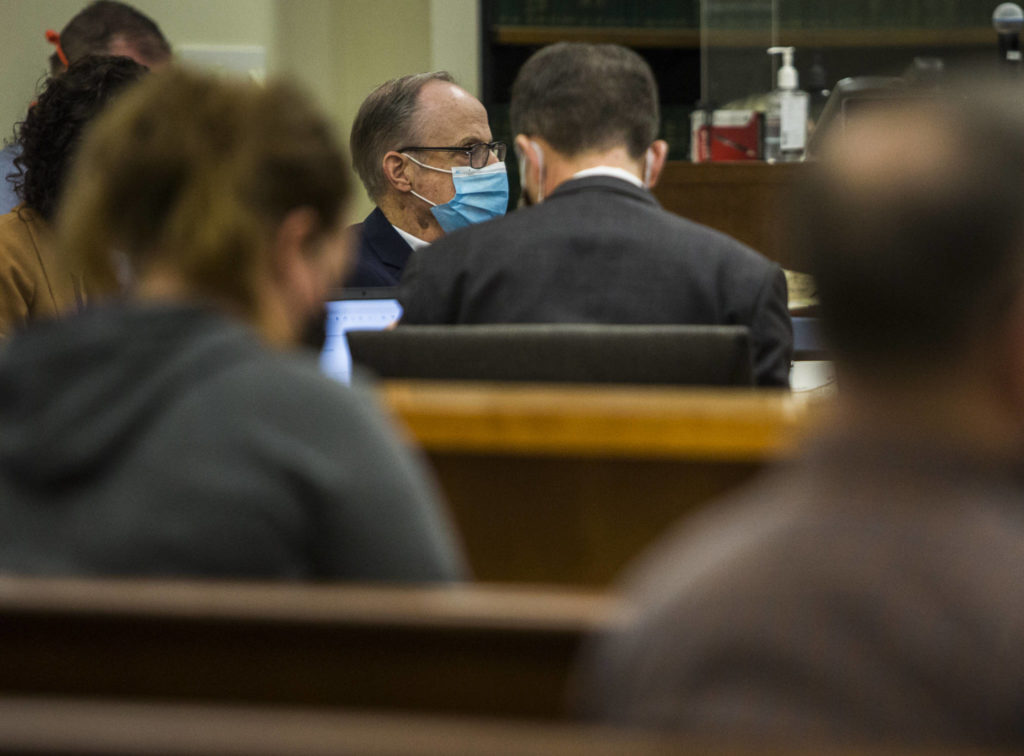 Defendant Terrence Miller listens to testimony during his trial at the Snohomish County Courthouse on Thursday in Everett. (Olivia Vanni / The Herald) 
