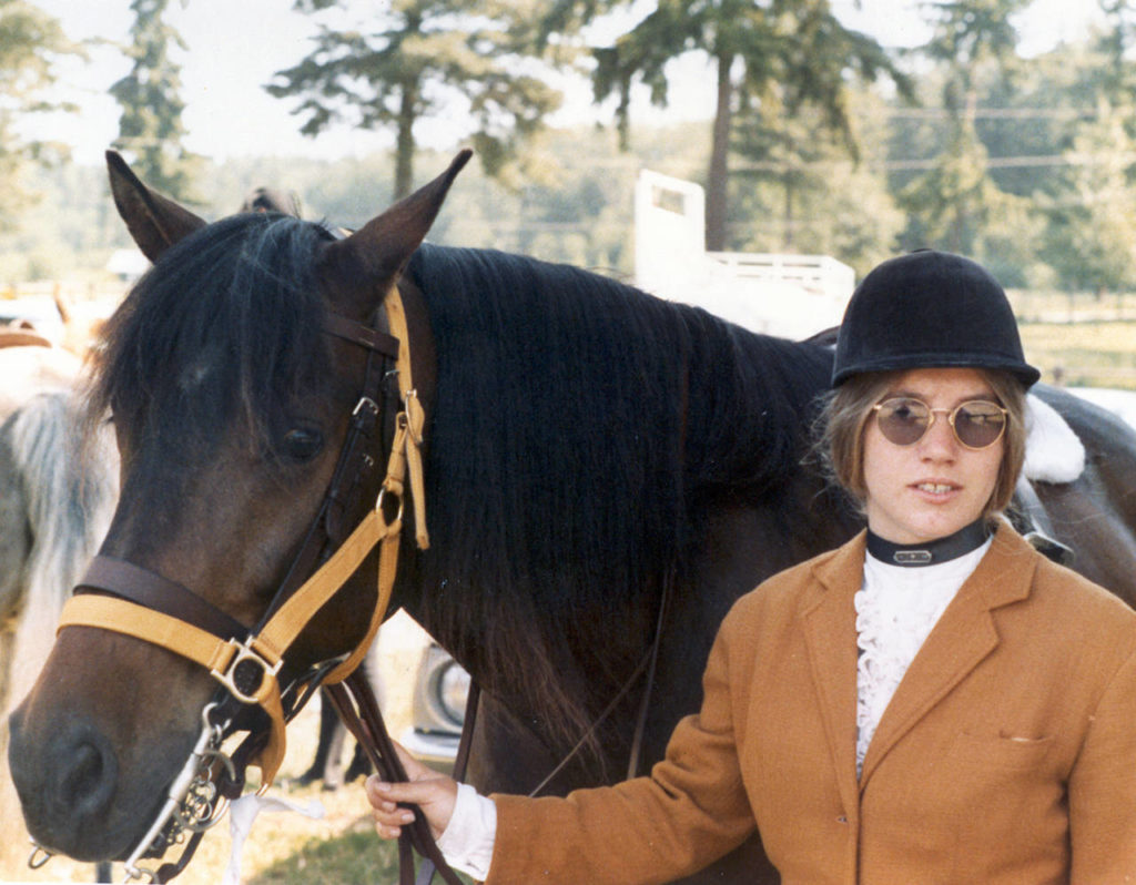 Jody Loomis with her horse in 1972. (Snohomish County Sheriff’s Office) 
